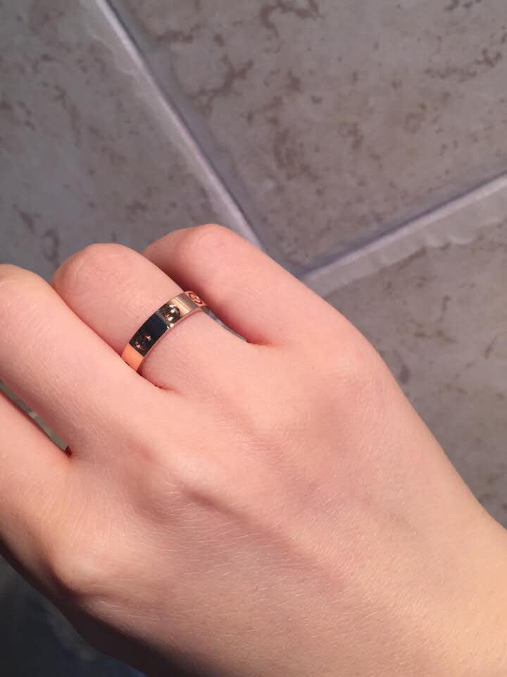cartier love ring on hand