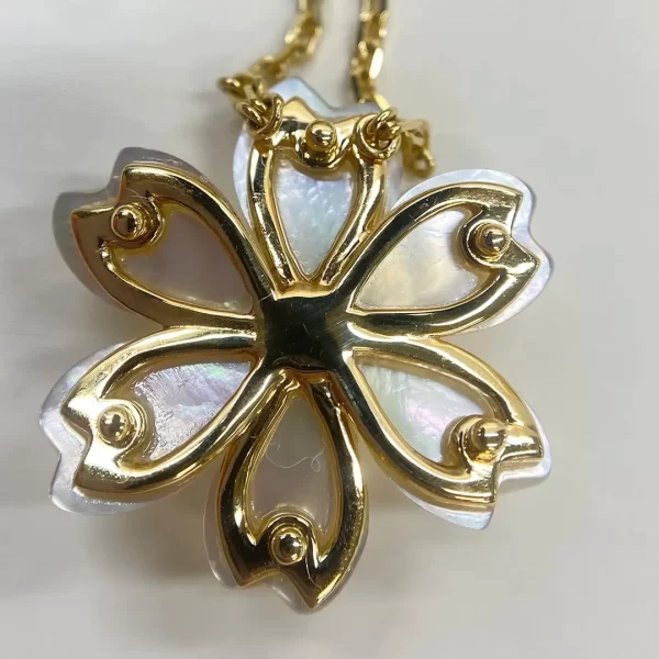 copy van cleef rose de nodel pendant