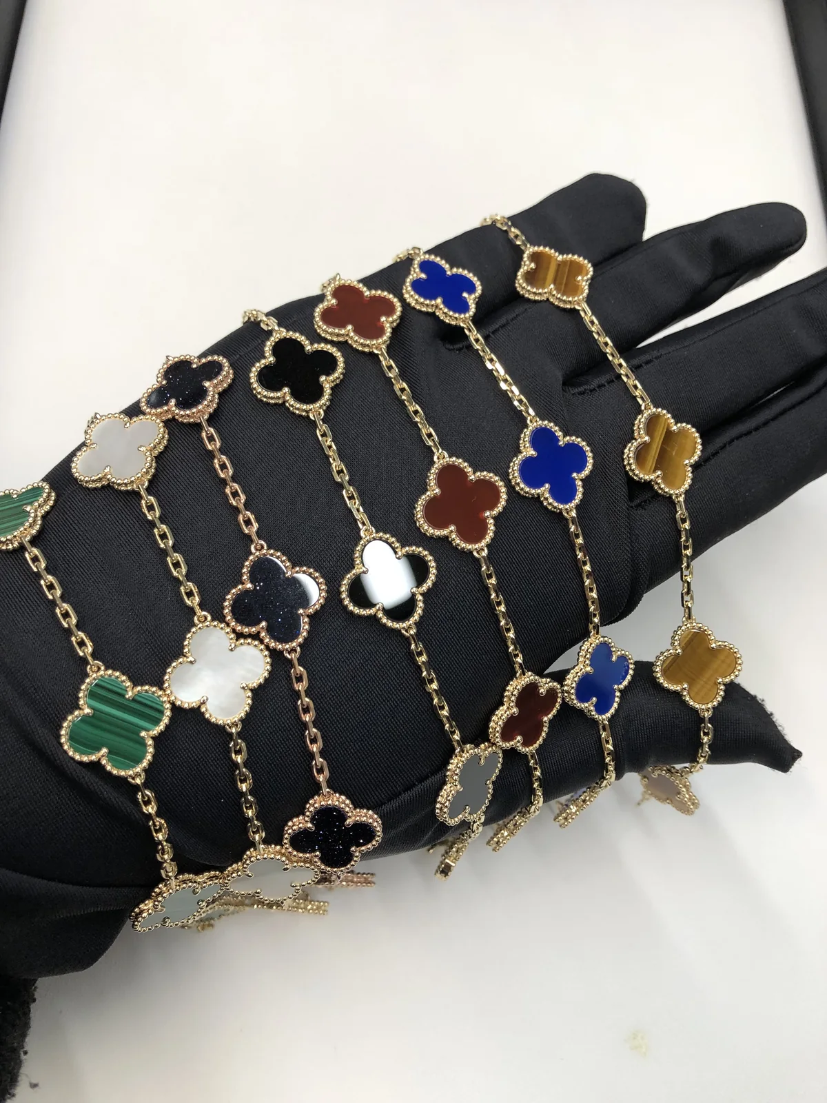 Top-quality Vintage Alhambra-style bracelets made with whole natural-stone motifs in several colors