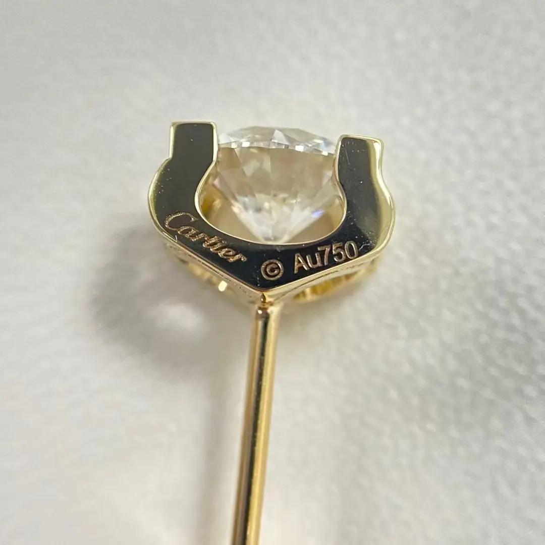 Side view of the C de Cartier style stud earrings